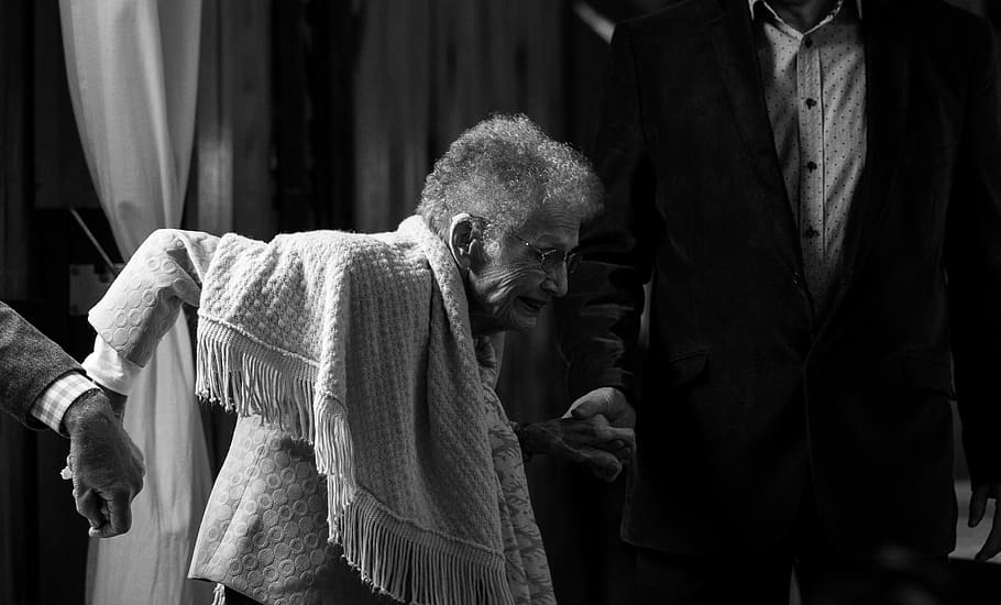 grayscale photo of woman with scarf, man holding woman, Social Security HD wallpaper