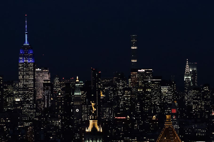 aerial photo of city during nighttime, high rise building photo HD wallpaper