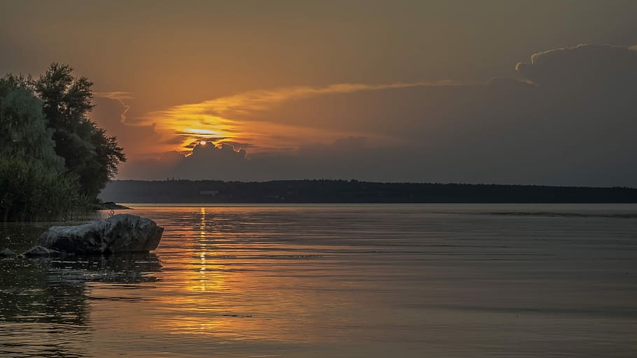 sunset, stone, beach, tree, clouds, river, water, sky, scenics - nature HD wallpaper