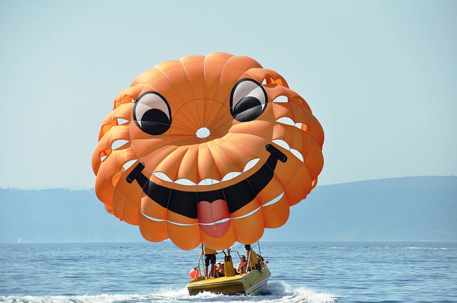 parachute, smiley, sea, water, safety, sky, orange color, protection HD wallpaper