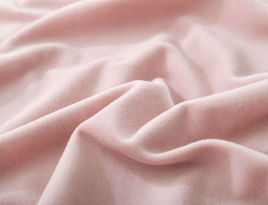 close up photo of pink fleece textile, velvet, pink red, fabric