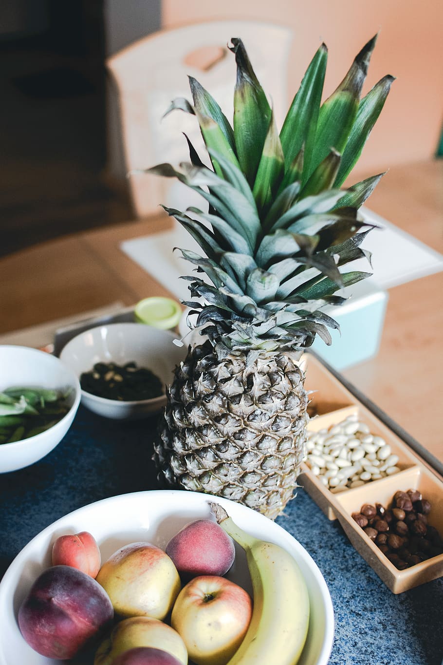 Pineapple in a kitchen, home, fruit, food, freshness, table, healthy Eating HD wallpaper