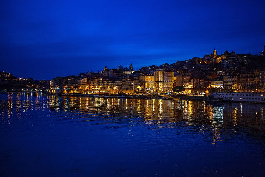 city skyline at night, photo of city during nighttime, water HD wallpaper