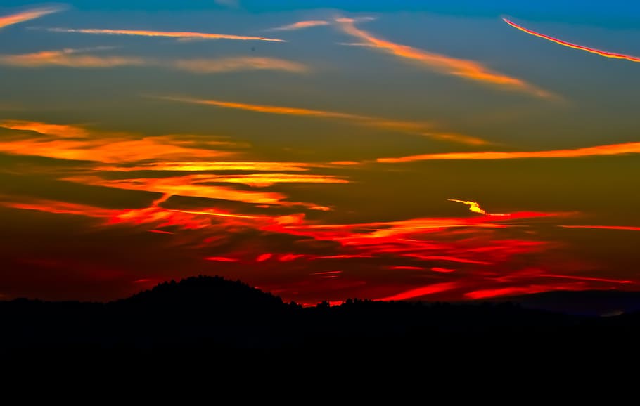 silhouette of mountain under golden hour, sunset, winter, contrail HD wallpaper