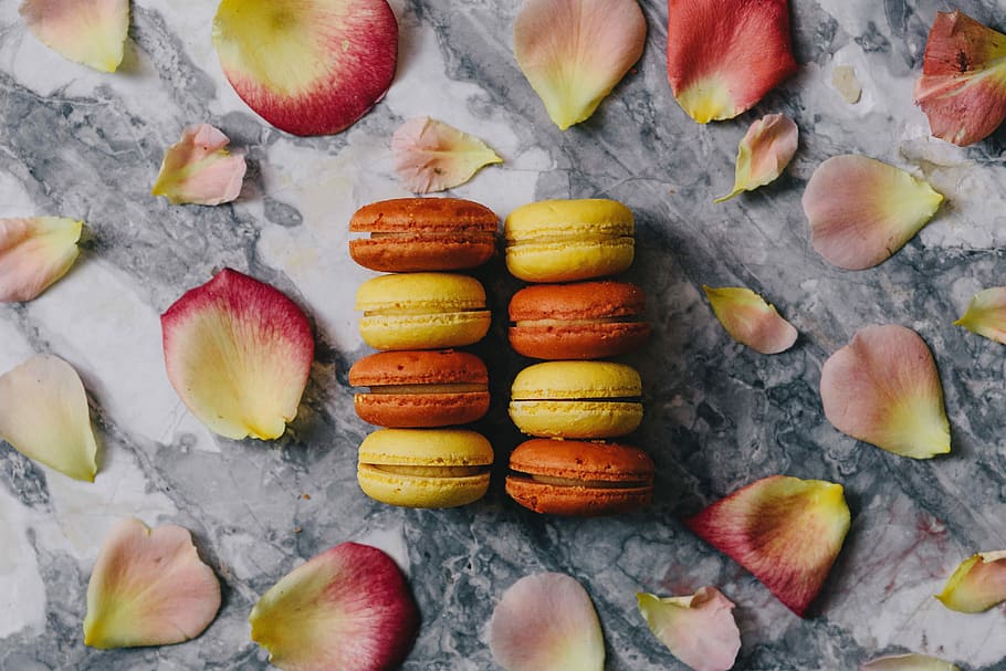 Overhead view of macarons on a marble slab, roses, yellow, sweet, HD wallpaper