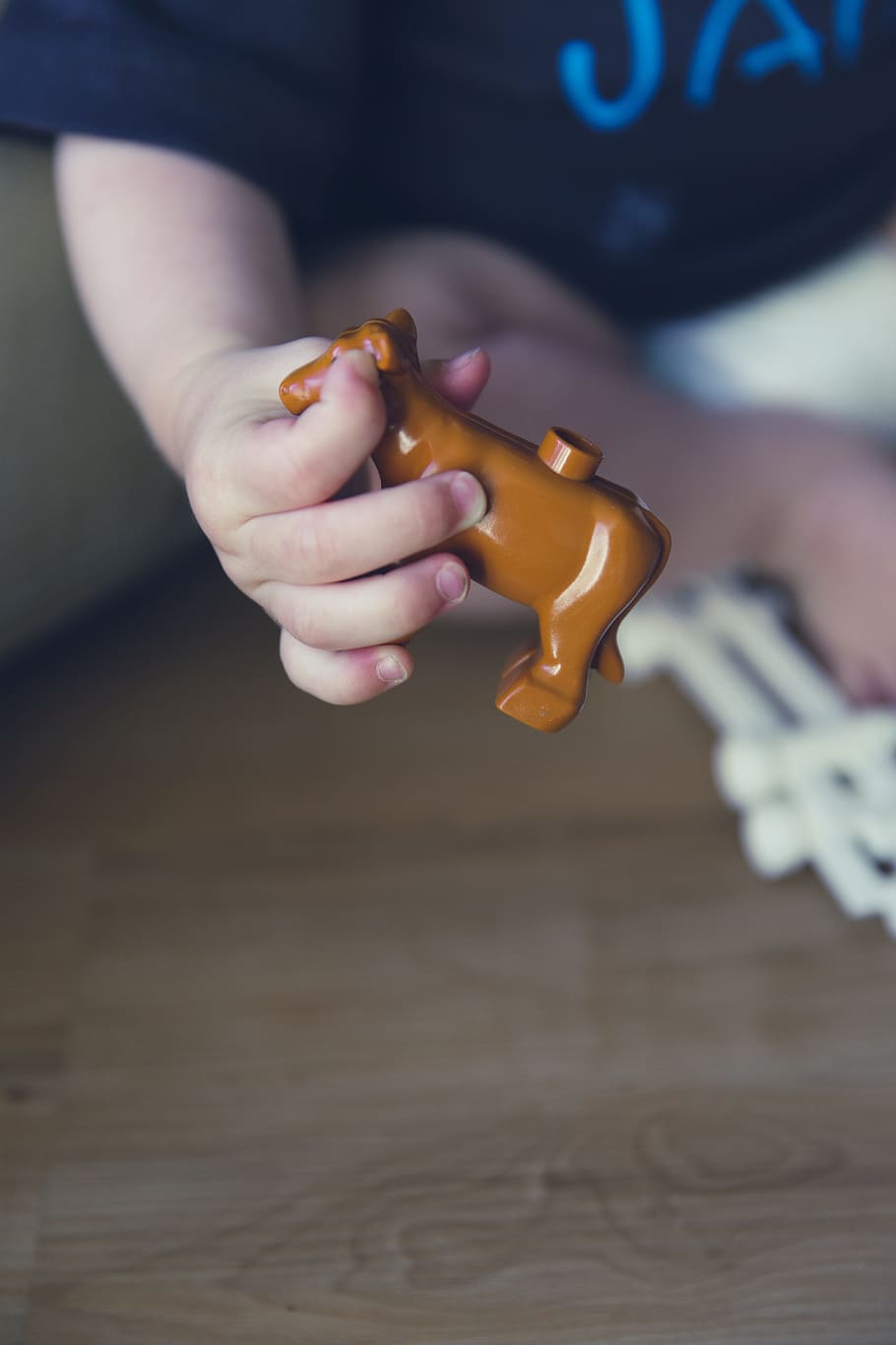 child, play, cow, miniature, children, toys, cheerful, happy HD wallpaper