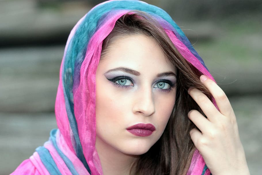 woman wears blue and pink head scarf, girl, cover, oriental, blue eyes