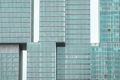 green and gray glass buildings, curtain wall building at daytime HD wallpaper