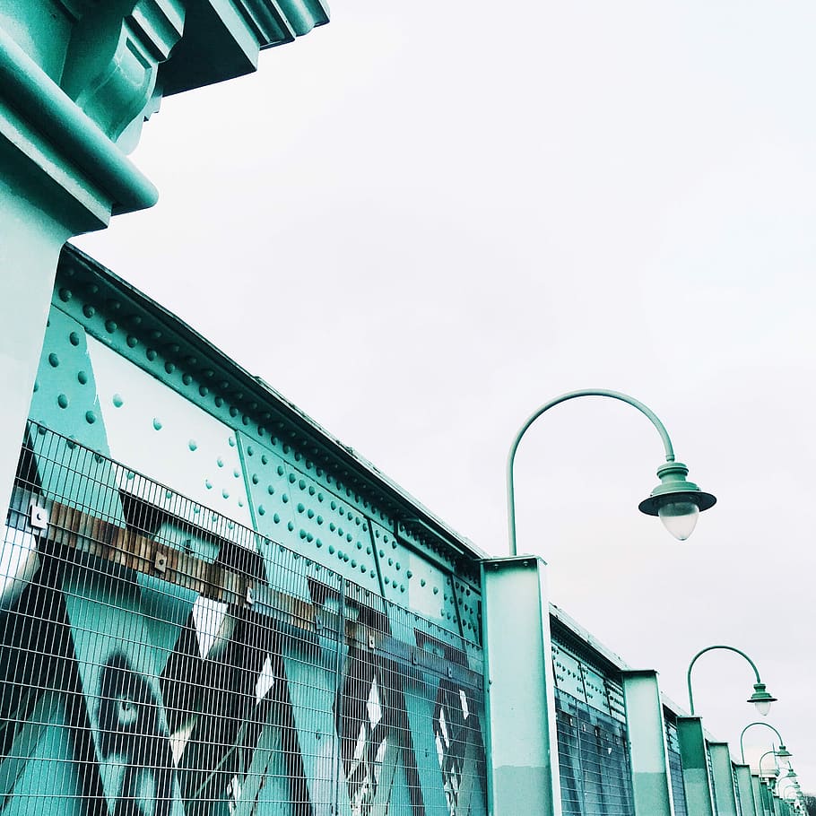 gray street light post, bridge, structure, iron, green, graffiti HD wallpaper