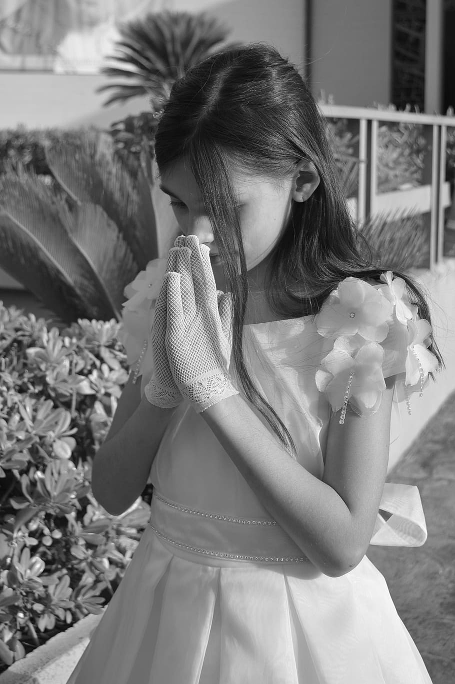 grayscale photography of praying girl while standing, before HD wallpaper