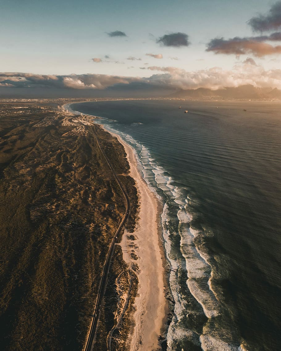 brown sand near body of water during daytime, aerial photography of beachline HD wallpaper