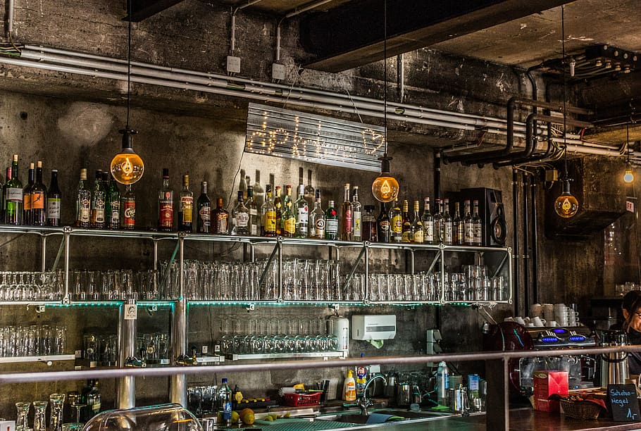 bottle and glass display inside room, assorted liquor bottles on gray steel rack HD wallpaper