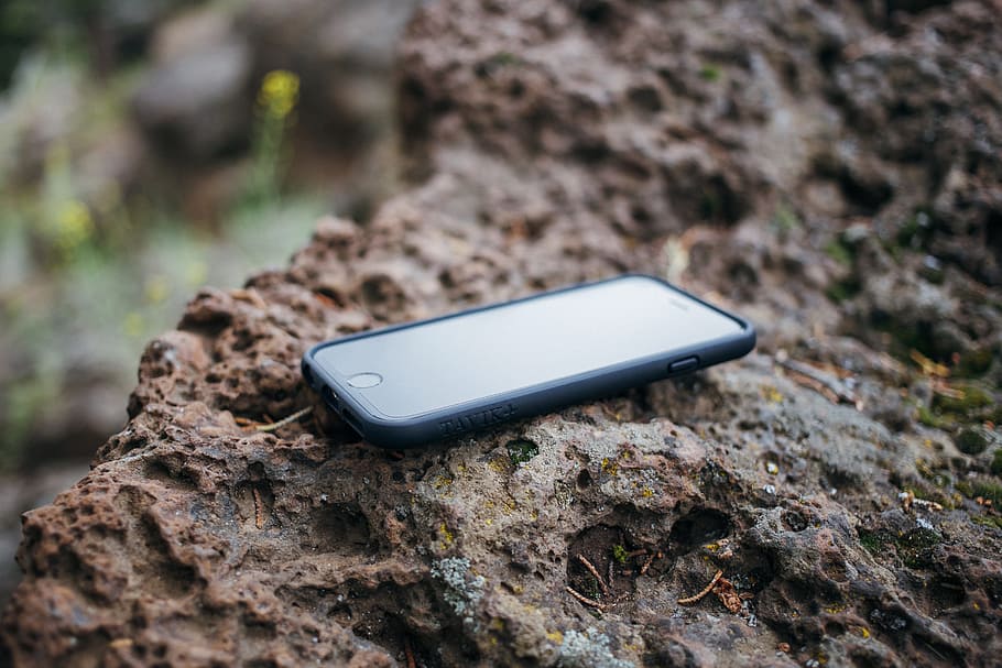 black iPhone 7 and black case on brown surface, mobile, camera HD wallpaper