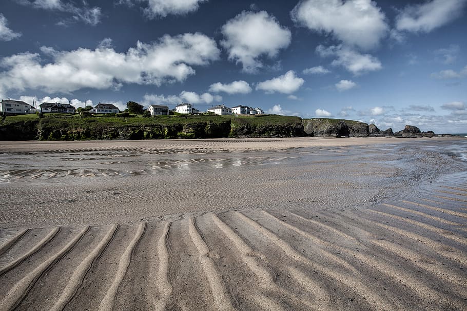 Sandy beach in Cornwall, England. This image was captured at Porthcothan Bay HD wallpaper
