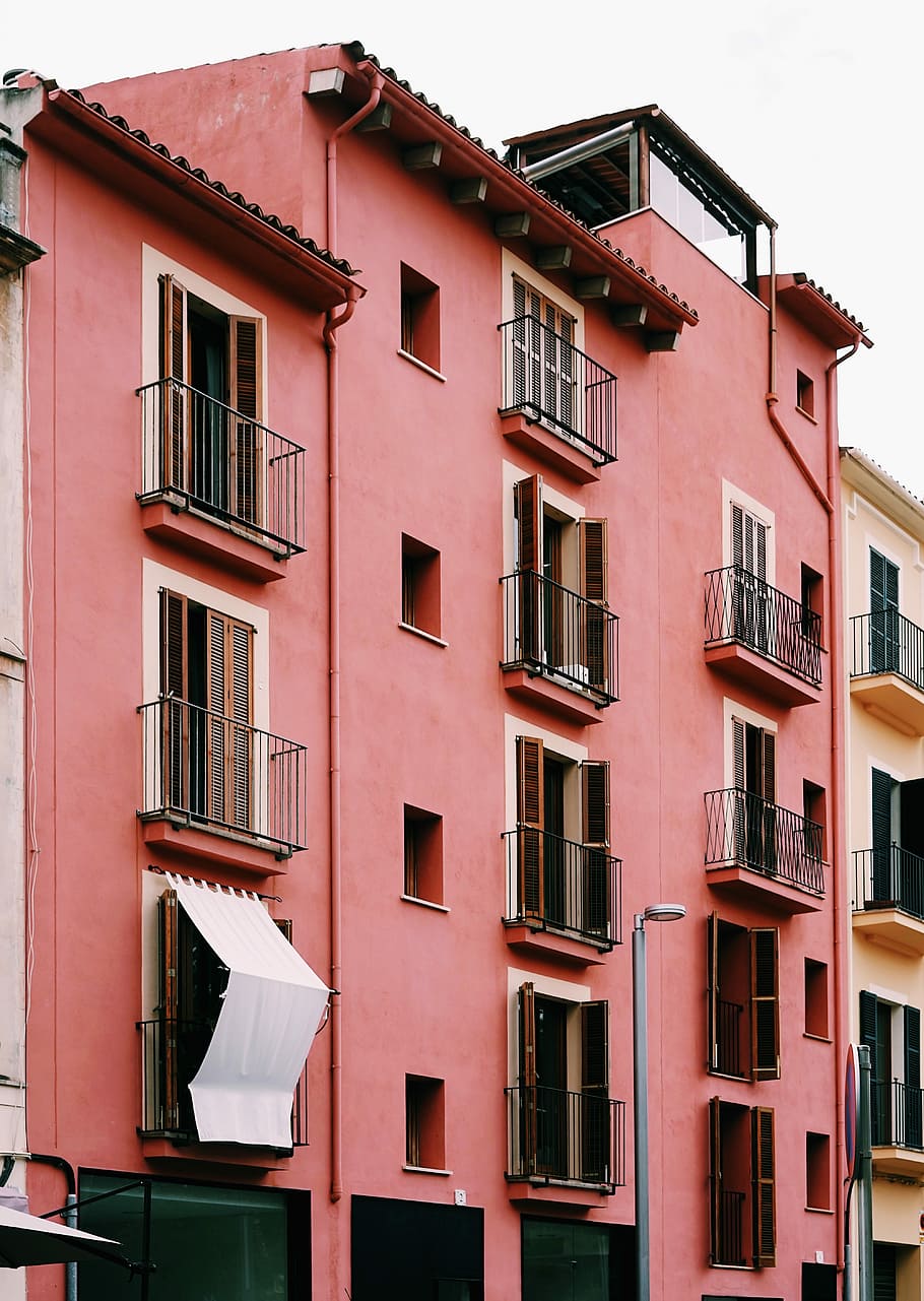 pink painted aparment, pink painted 5-storey building taken at daytime HD wallpaper