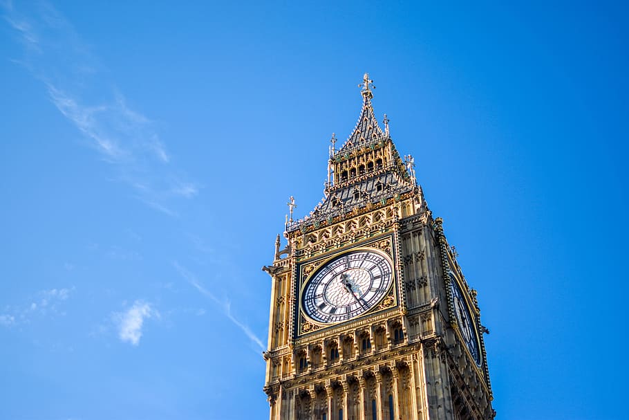 Low Angle View of Clock Tower Against Blue Sky, ancient, architecture HD wallpaper