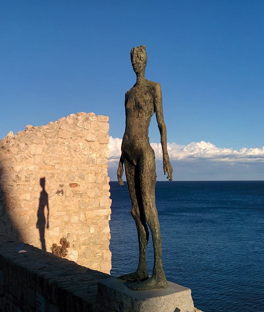 Shadow, Silhouette, Statue, Thin, Tall, metal, sea, sun, sky HD wallpaper