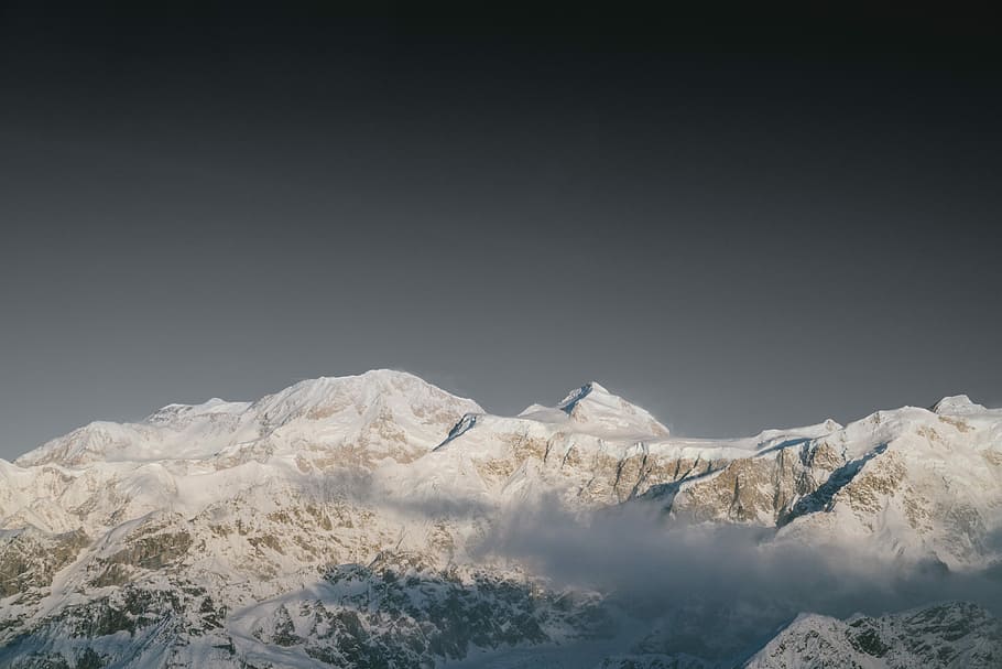 mountain range covered with white snow, aerial photography of snow-covered mountain HD wallpaper