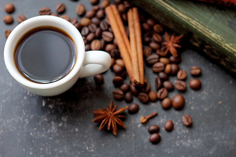 white ceramic coffee mug beside coffee beads, book, notebook HD wallpaper