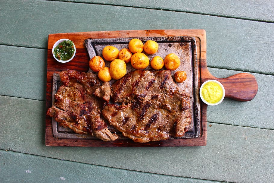 grilled meat and fried balls on wooden board, Food, Colombian