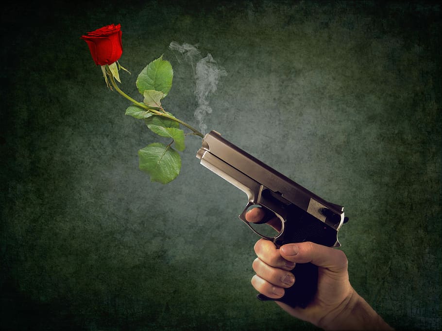 person holding semi-automatic handgun, peaceful, non-violent HD wallpaper