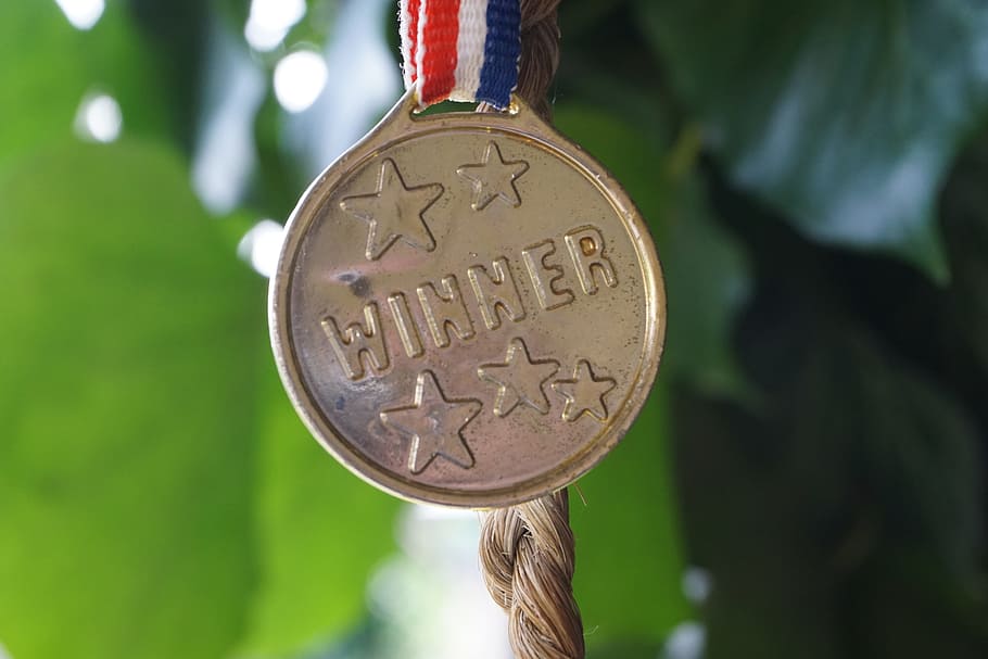 close up focus photography of gold Winner medal, profit, award, HD wallpaper