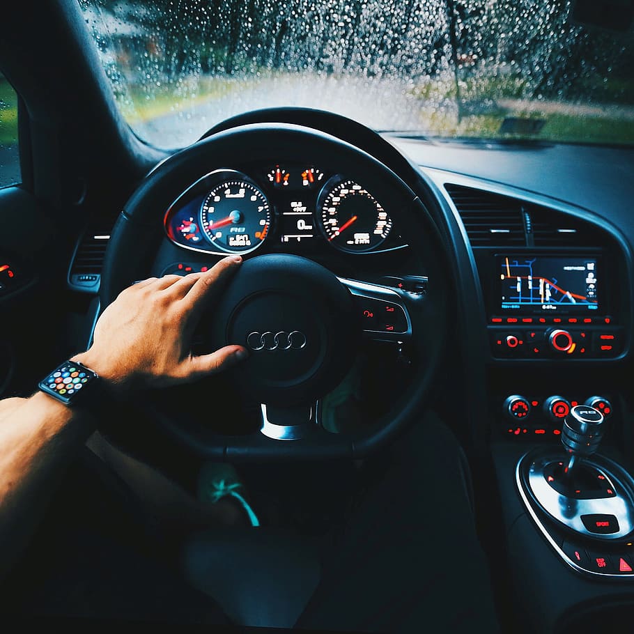 person driving Audi car, automotive, dashboard, drive, hand, odometer
