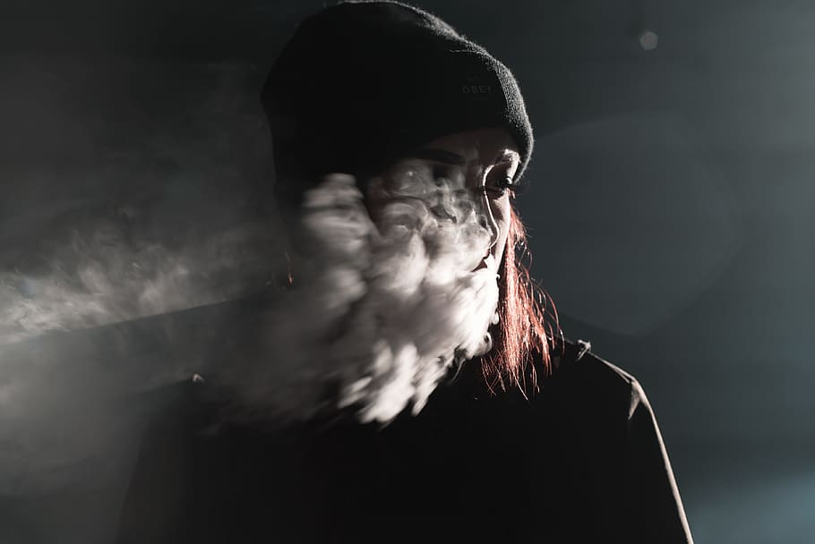 portrait photography of person blowing smoke, untitled, grayscale