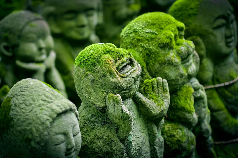 human concrete statue with moss, kyoto, japan, jizo, japanese