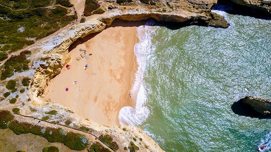 body of water beside brown sand during daytime, aerial view of seashore HD wallpaper