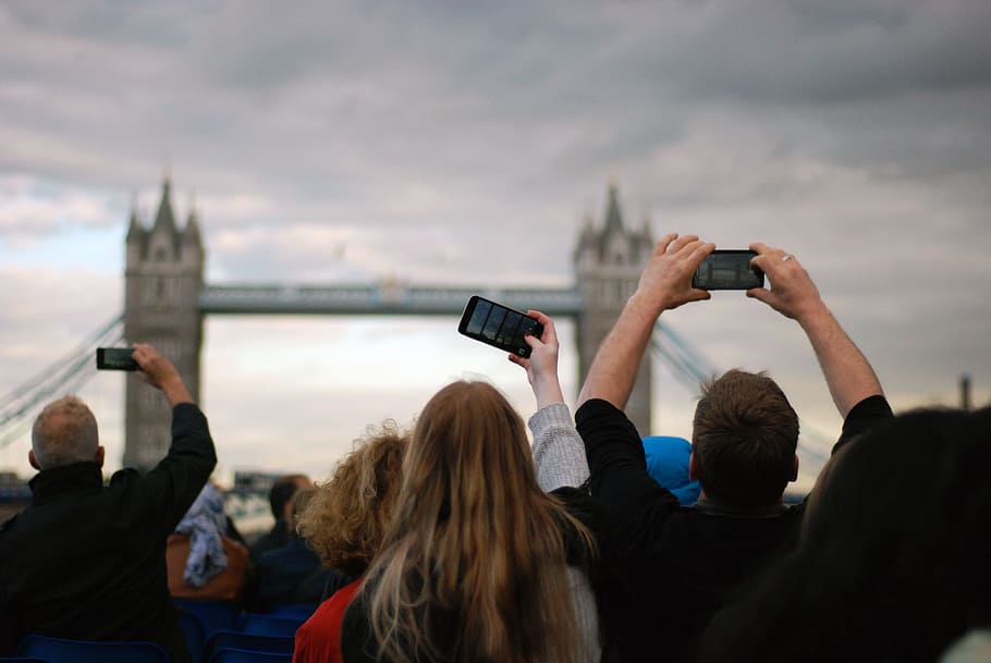 People Taking Picture at Tower Bridge Under Gray Clouds, adult