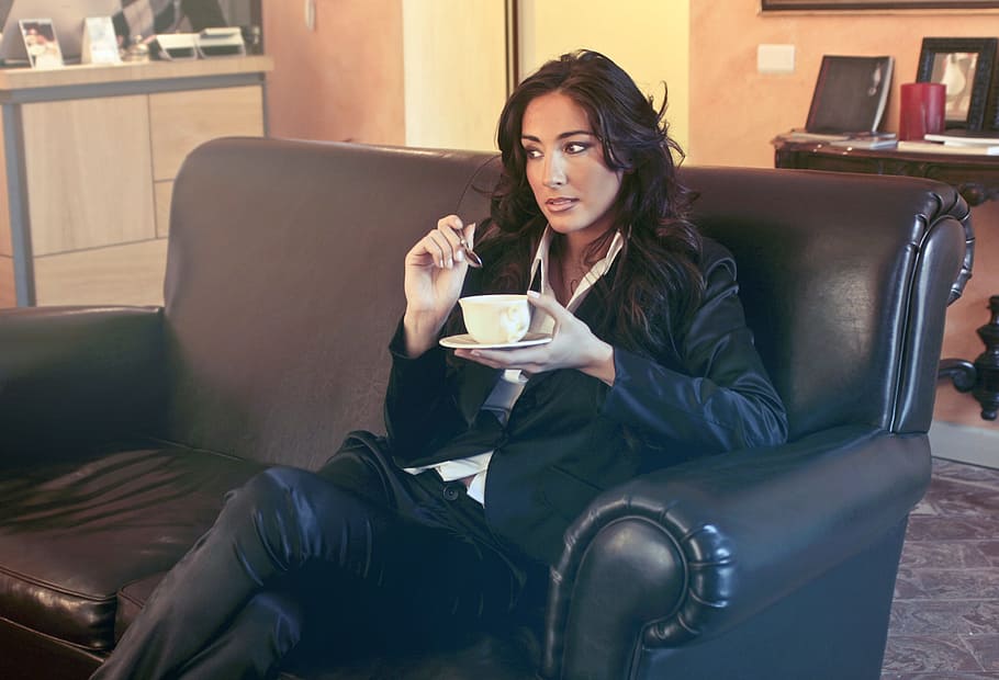 Woman in Black Blazer Holding Teacup While Sits on Black Sofa, HD wallpaper