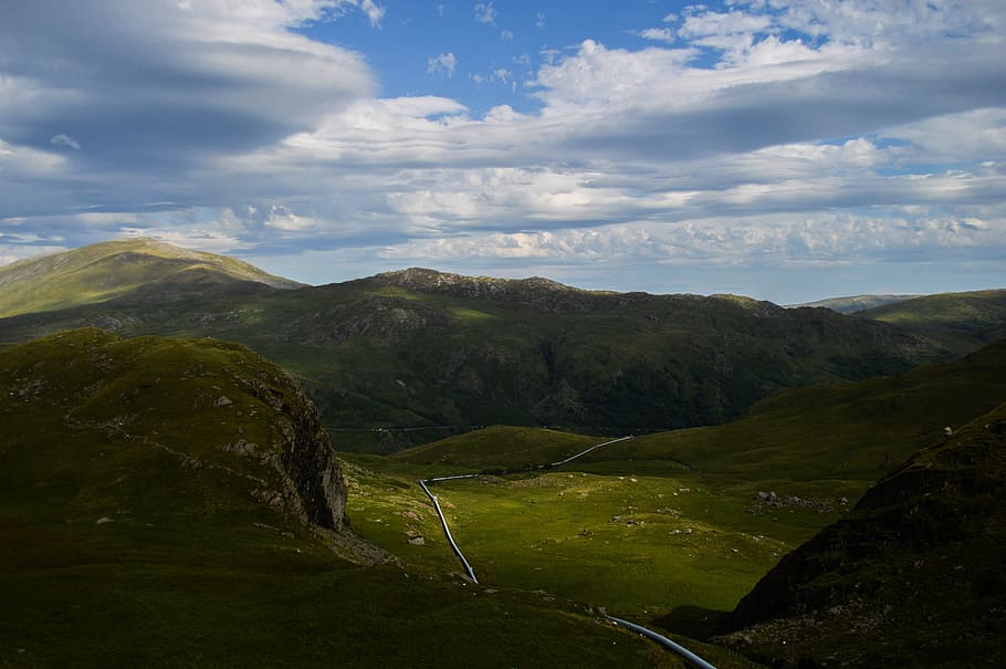 Pipeline, green mountains during cloudy day, hill, field, grass HD wallpaper