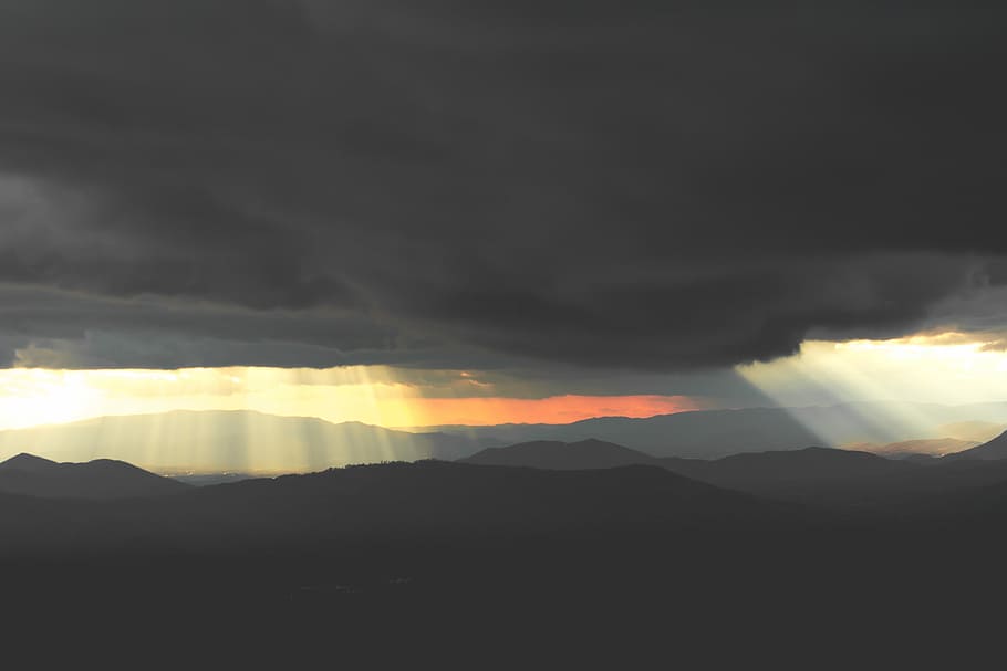 landscape photography of mountains and clouds, sunrays through clouds with mountain silhouette HD wallpaper