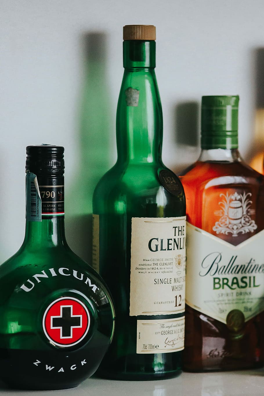 Bottles with liquor, alcohol, unicum, ballantines, glenlivet