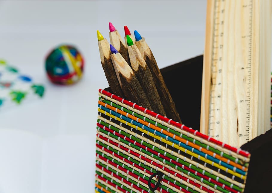 six assorted-color pencils in brown basket, sharpener, art HD wallpaper