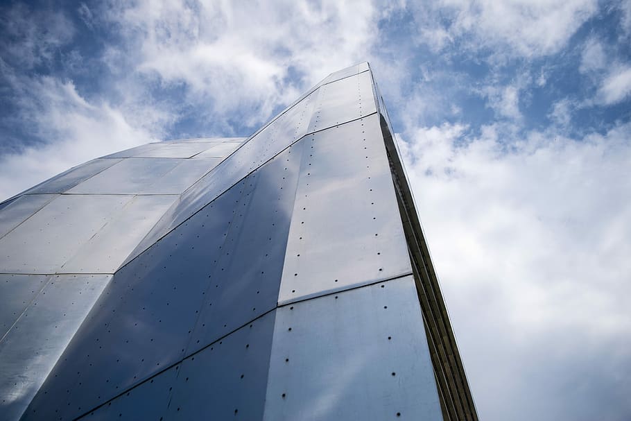 high-rise building under cloudy sky during daytime, worm's eye view photography of gray high-rise building HD wallpaper