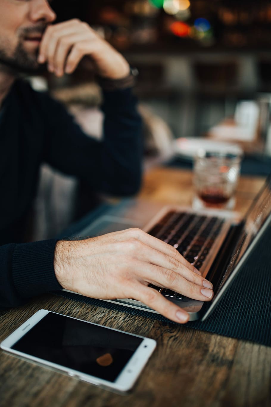 Young Entrepreneur Working from a Modern Cafe, interior, workspace HD wallpaper