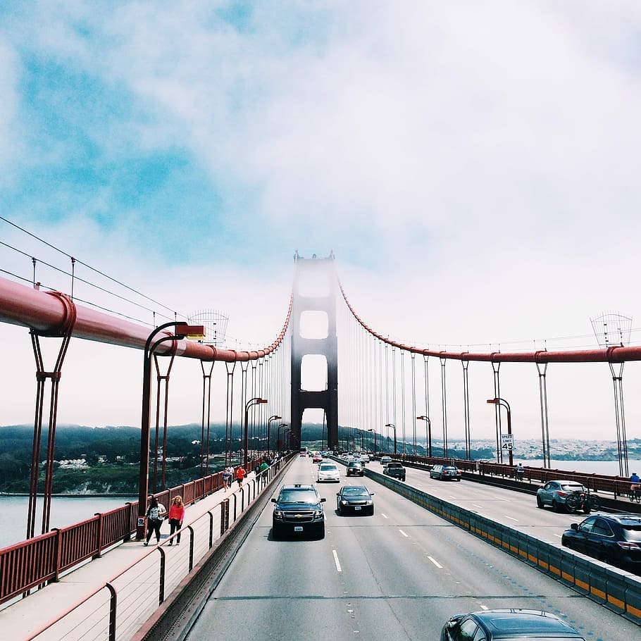 people walking on sidewalk during daytime, cars on Golden Gate bridge HD wallpaper