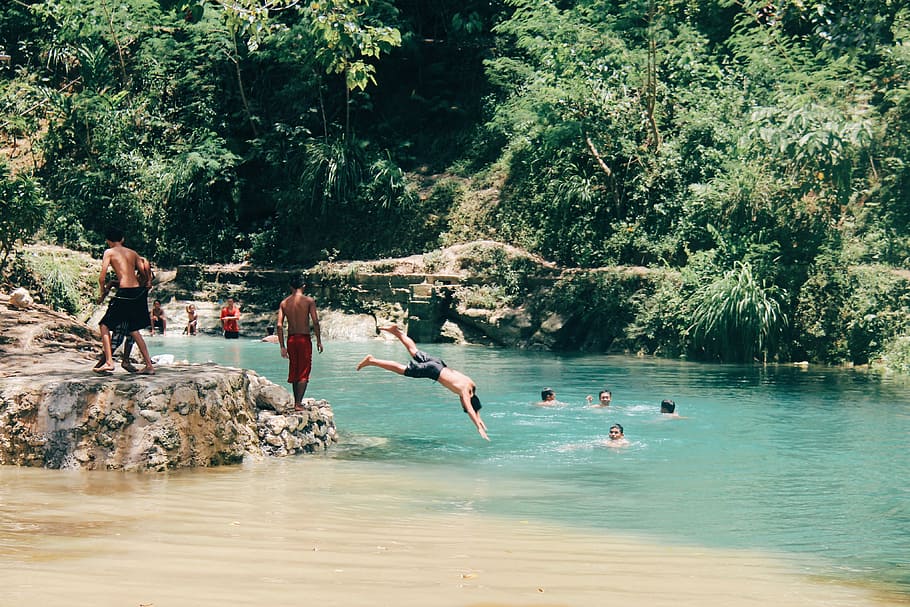 man diving at water with people at river daytime, man diving in water HD wallpaper