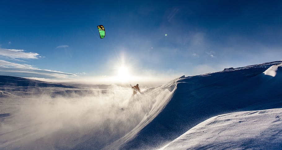 person riding on snow kiting during daytime, cold, fog, fun HD wallpaper