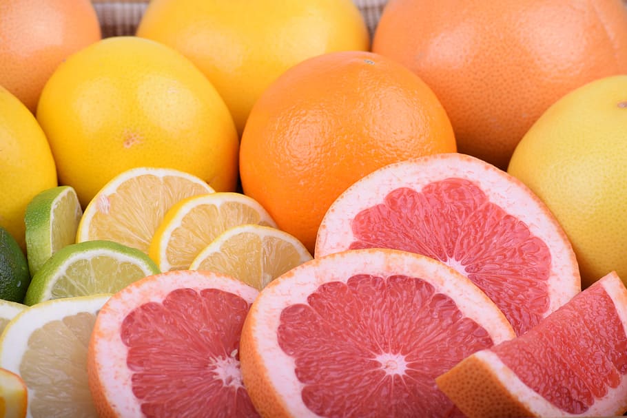 sliced orange fruits, grapefruit, grapefruit red, grapefruit yellow HD wallpaper
