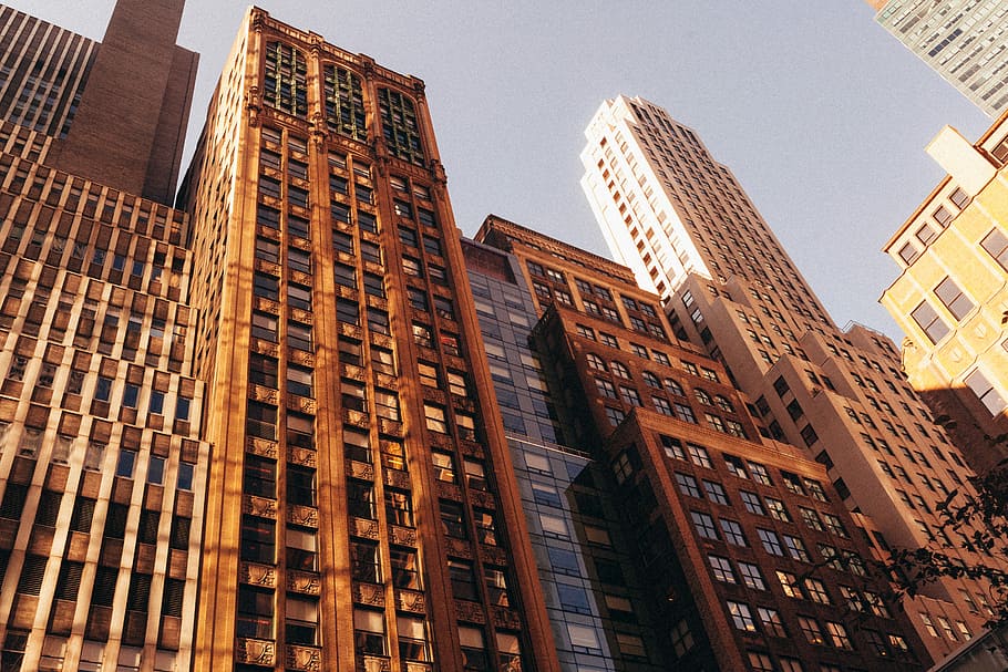 low angle photography of concrete buildings during daytime, low-angle photography of high-rise buildings HD wallpaper