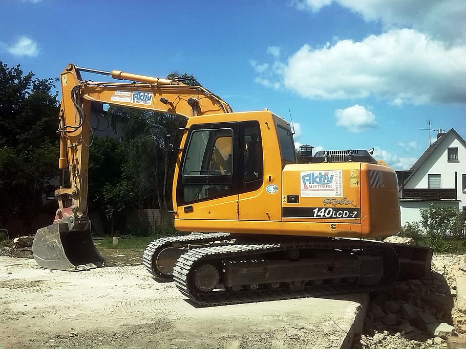 yellow and black backhoe near the tree, excavators, construction machine HD wallpaper