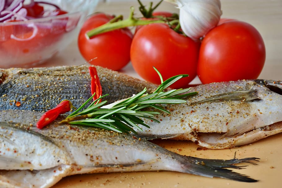 raw fish beside tomatoes, sea bream, uncooked, potatoes, kitchen HD wallpaper
