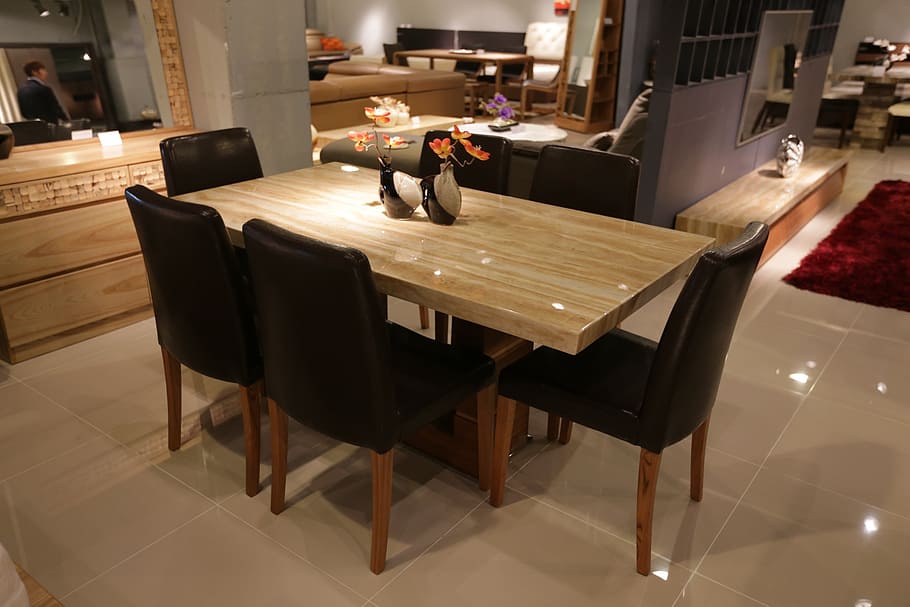 brown wooden table and six black parson chairs dining set, dining room