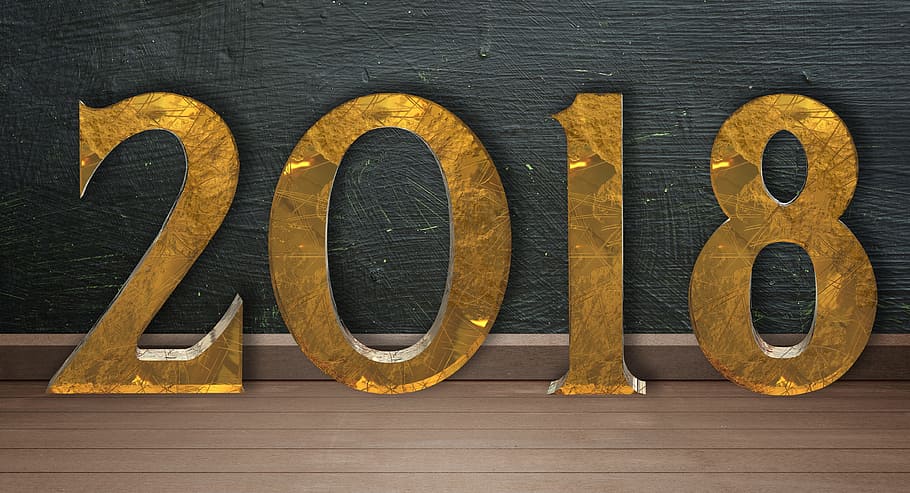 gold 2018 freestanding numbers on top of brown wooden surface HD wallpaper