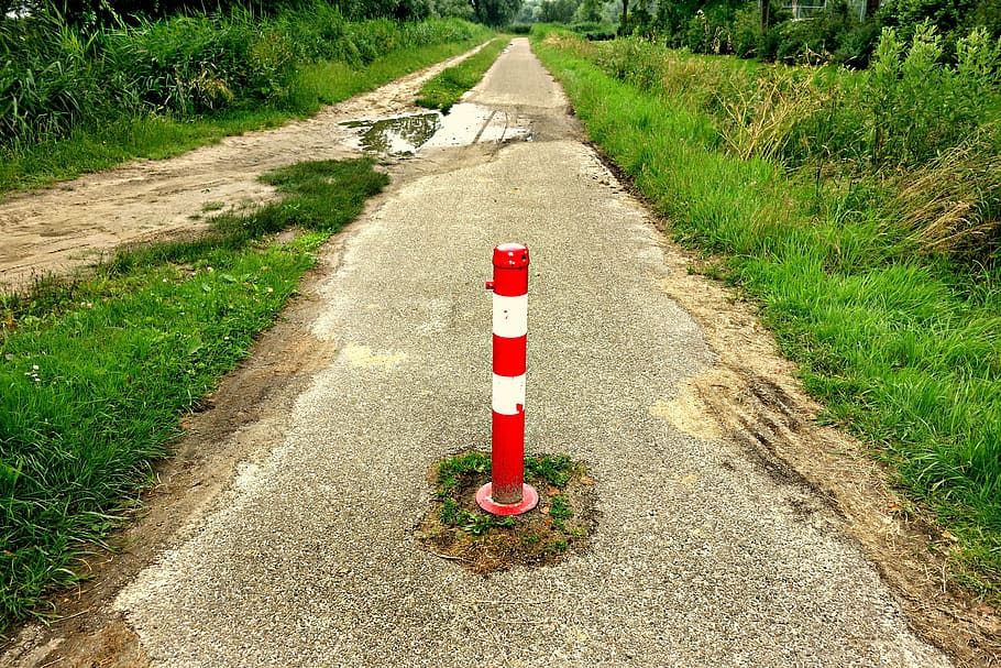 red traffic post between gray asphalt road, adjustable road block HD wallpaper