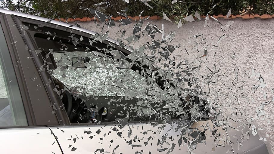 photo of broken car window glass, car accident, broken glass