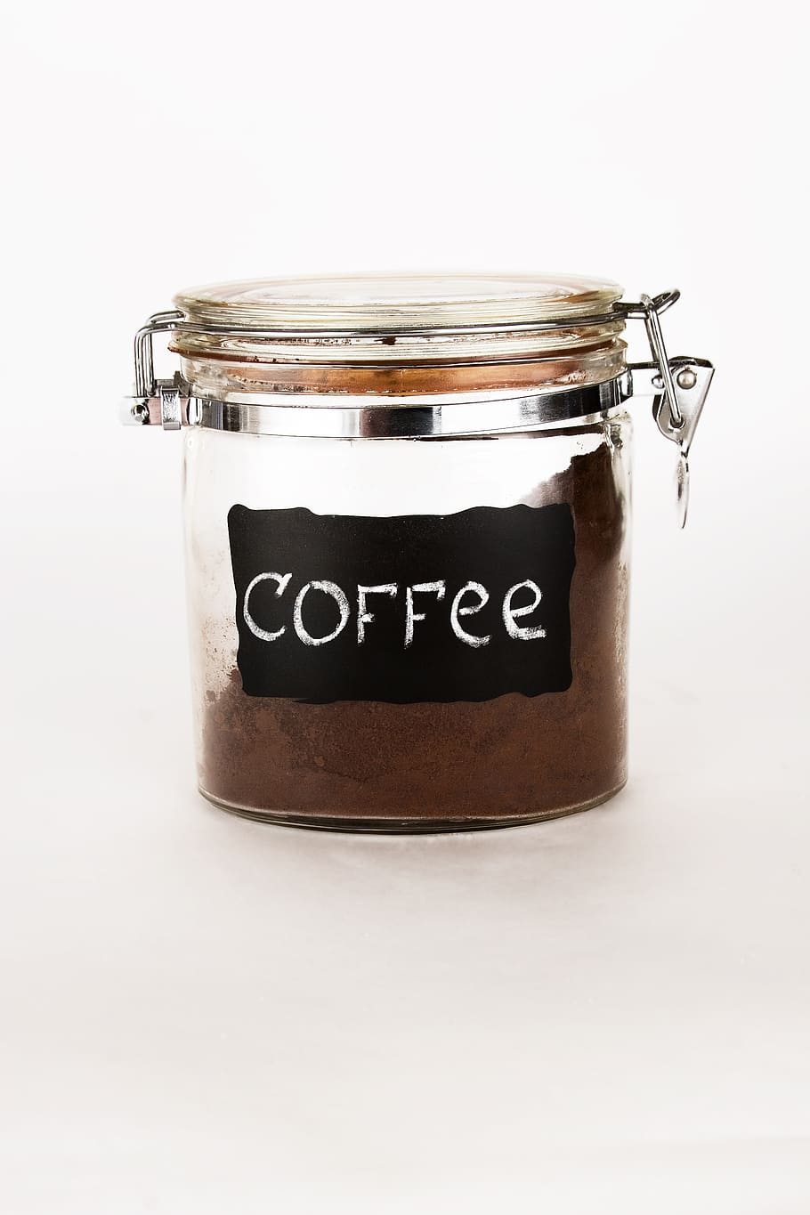 airtight canister filled with coffee powder, cappuccino, metal